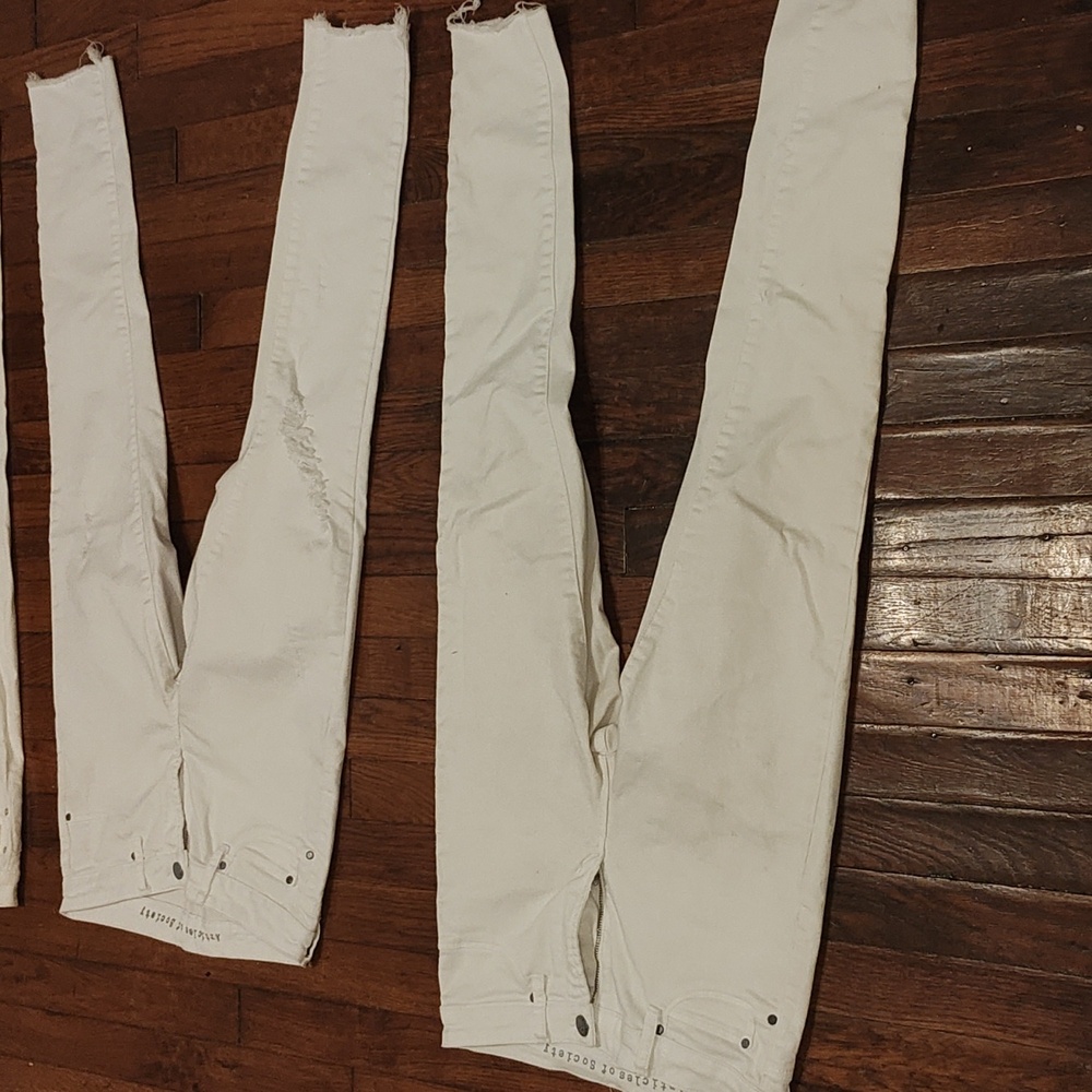 2 pairs women's jeans, size 26 and 27 (4S) white.